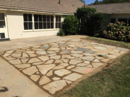 We built this flagstone patio with decomposed granite in the joints.
